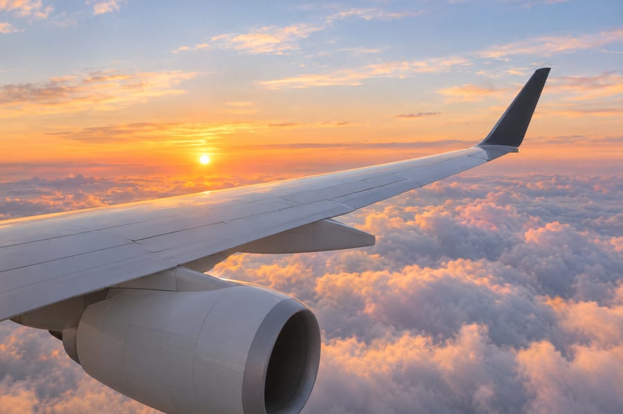 Private jet wing on the tarmac